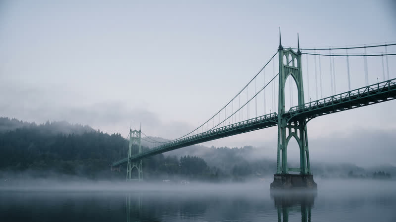 AI-rendered still of the St. Johns Bridge in fog